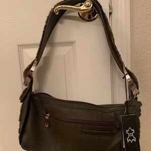 Brand new! M.C. Leather and faux fur purse!